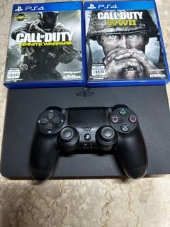 PS4 1TB W/ CONTROLLER + 2 Games
