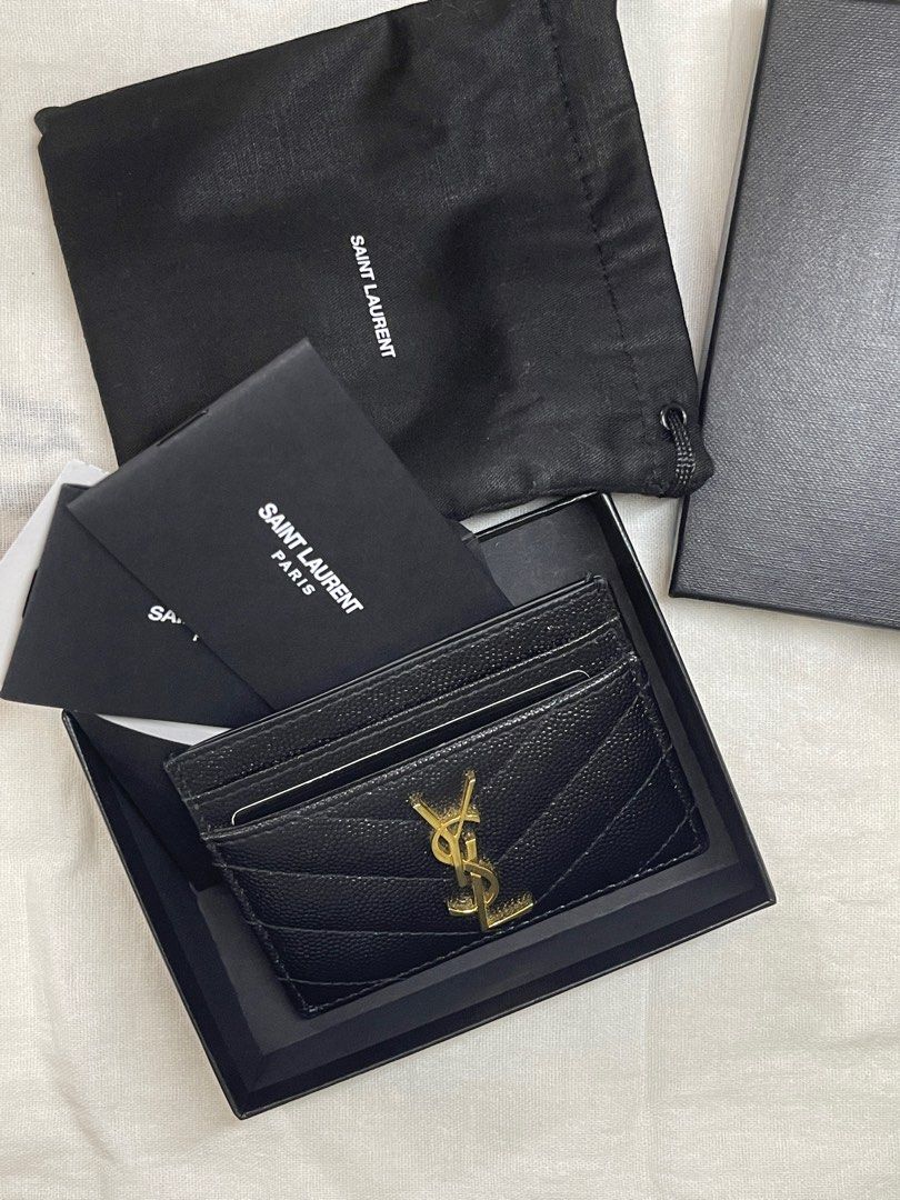 YSL Card Holder in Gold Hardware (Category: Luxury Bags & Wallets) located in San Pedro. Submitted by pandamate (Listing ID 1256761249, Image 1). Description: Authentic 💯 Bought in Marina Bay Sands in SG Dec 2022 Calfskin leather with chevron stitching Minor scratches on the logo Comes with the original box, dust bag, and paper bag so you can enjoy the unboxing experience 💖 Still negotiable 😉 RFS: Extra card holder.