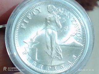 1945s  50 centavos silver coin
