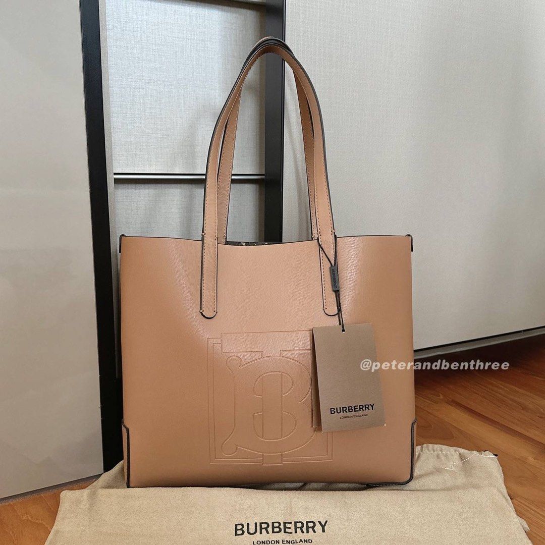 Embossed monogram motif leather tote 2025