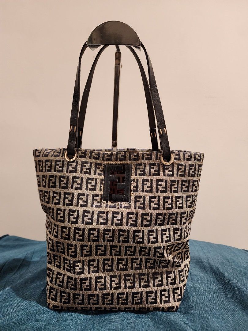 Fendi bag bucket type (Category: Luxury Bags & Wallets) located in Quezon City. Submitted by chingtiagped (Listing ID 1256913097, Image 1). Description: Fendi zucca bag. Versatile, can be handbag or shoulder bag. Trimmings and handles are made of leather. Preloved but in excellent condition, no flaws. Negotiable. No low ballers please. SF c/o buyer..