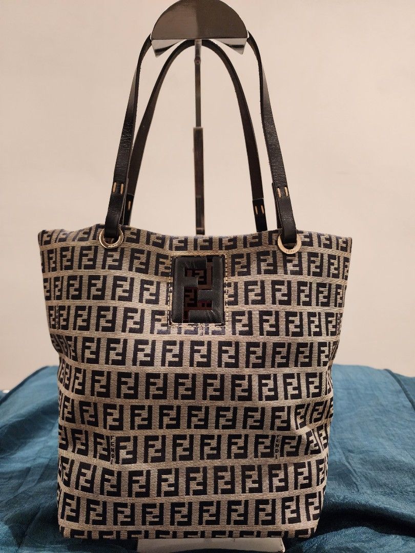 Fendi bag bucket type (Category: Luxury Bags & Wallets) located in Quezon City. Submitted by chingtiagped (Listing ID 1256913097, Image 2). Description: Fendi zucca bag. Versatile, can be handbag or shoulder bag. Trimmings and handles are made of leather. Preloved but in excellent condition, no flaws. Negotiable. No low ballers please. SF c/o buyer..