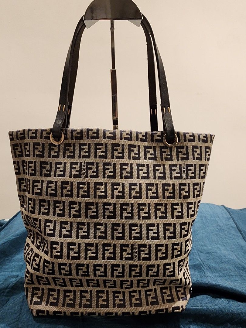 Fendi bag bucket type (Category: Luxury Bags & Wallets) located in Quezon City. Submitted by chingtiagped (Listing ID 1256913097, Image 3). Description: Fendi zucca bag. Versatile, can be handbag or shoulder bag. Trimmings and handles are made of leather. Preloved but in excellent condition, no flaws. Negotiable. No low ballers please. SF c/o buyer..