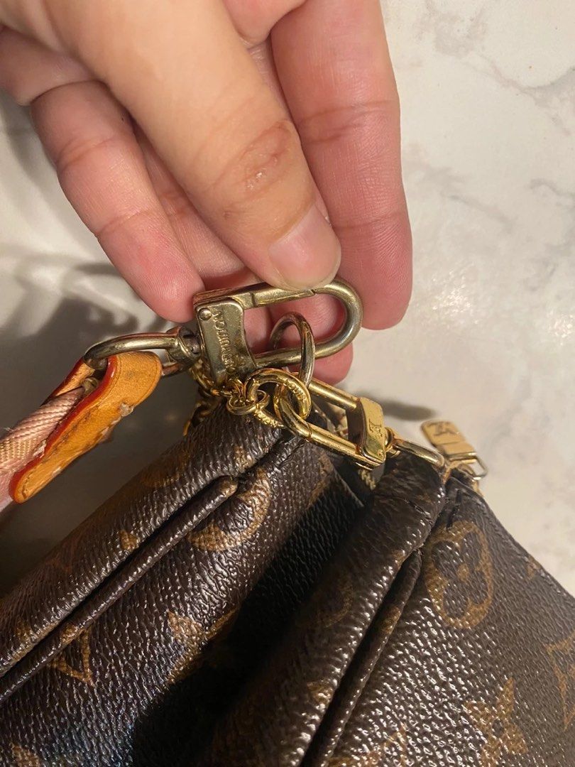 Tarnishing/peeling on mini pochette zipper