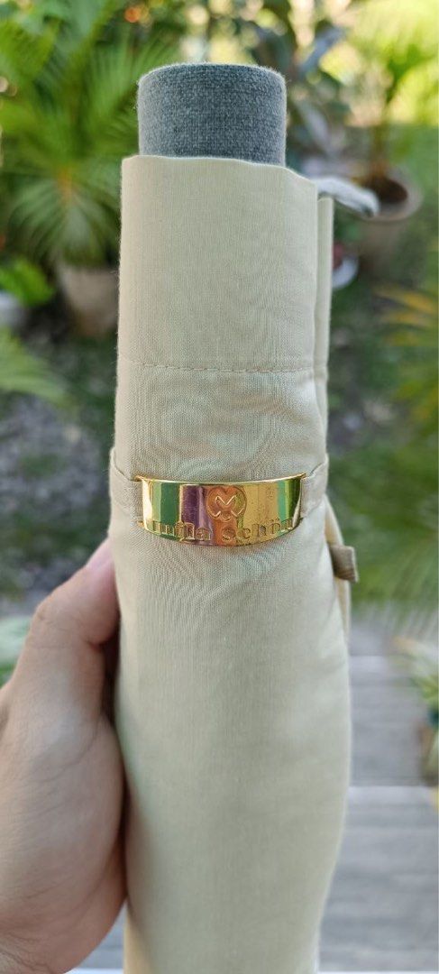 Mila Schon Folding Umbrella (Category: Umbrellas) located in Tiaong. Submitted by flutterbyblush_shop (Listing ID 1256872773, Image 2). Description: Gold Hardware .