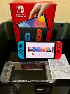 Nintendo Switch OLED with Games 6 mos old