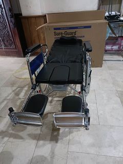 Reclining commode wheel chair