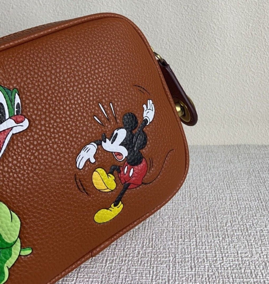 Coach mickey mouse sling bag deals