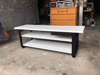 Tv rack 3tier up to 60inches with drawer  55L x 15 1/2W x 19H inches Wooden shelves Metal drawer and frame In good condition