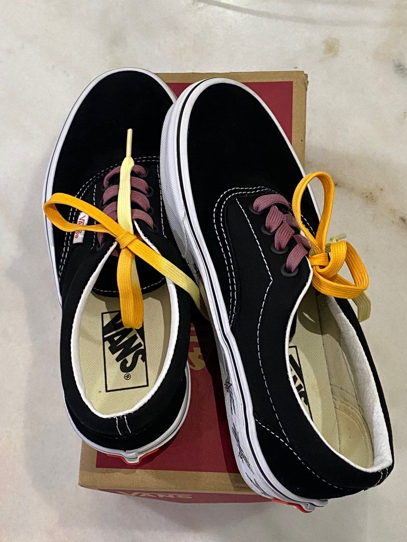 Black vans with yellow laces hot sale