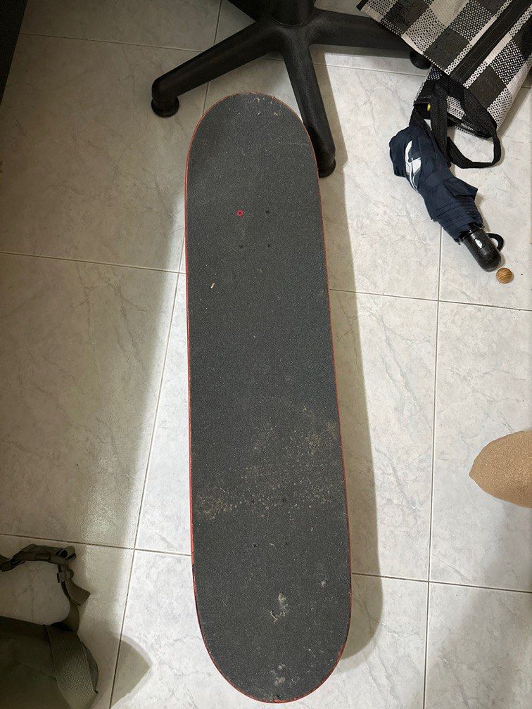 Almost batman deals skateboard