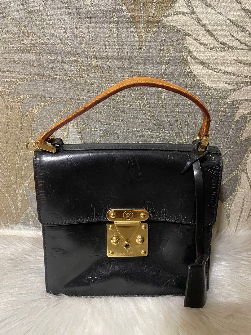 Authentic LV Vernis handbag (recolored) (Category: Luxury Bags & Wallets) located in Santa Rosa. Submitted by jessaruth (Listing ID 1257147528, Image 1). Description: Guaranteed authentic/original Recolored professionally Handle issue (see photo) Peeled one side inside (see photos) Can provide generic gold chain strap.