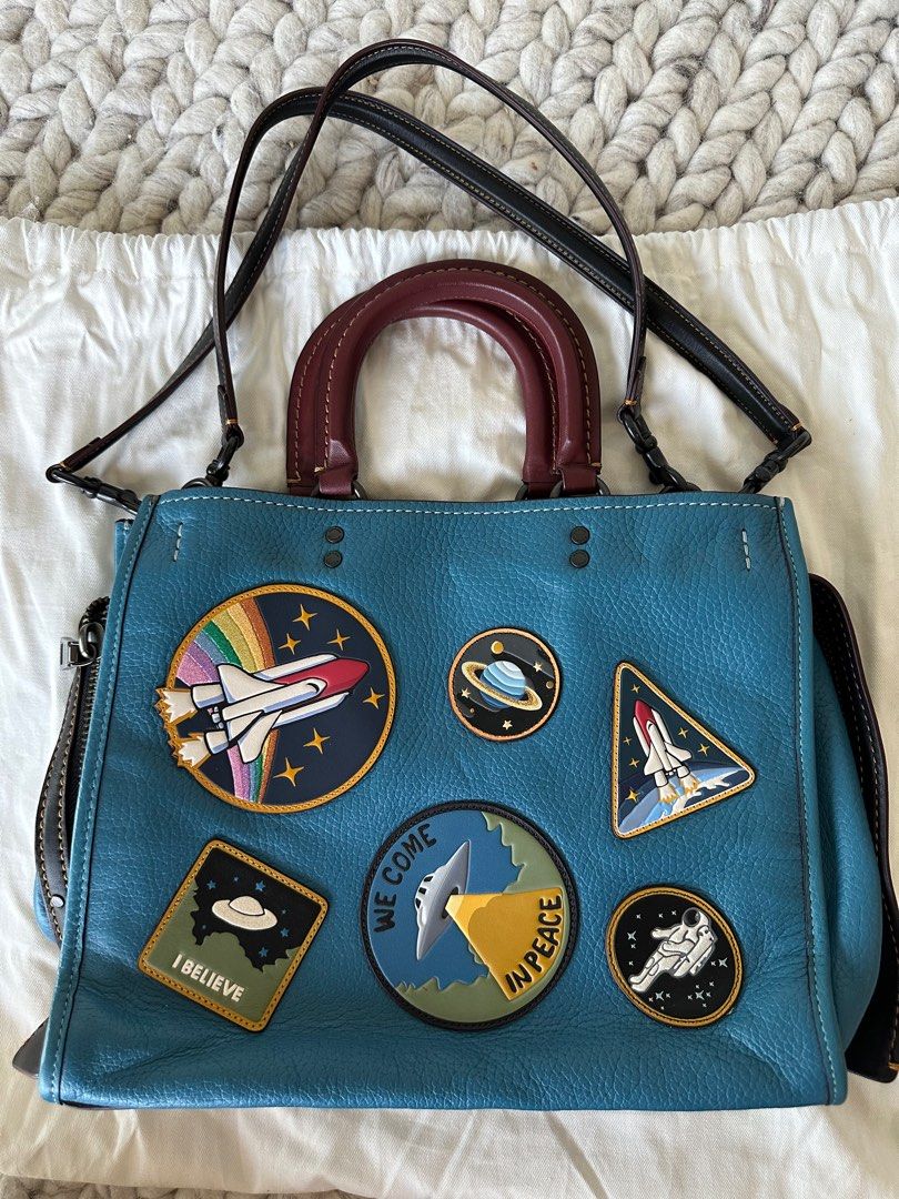 Coach nasa purse deals
