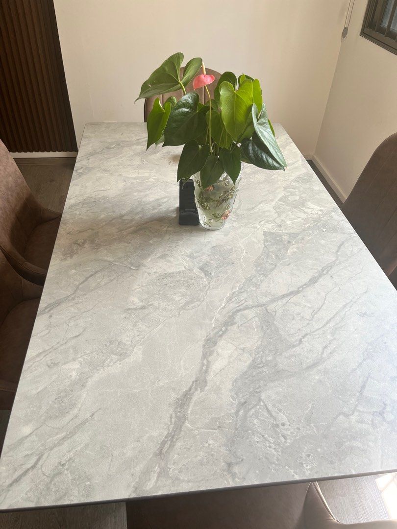 Dining Table set (Category: Tables & Sets) located in Singapore. Submitted by divarshene14 (Listing ID 1257054917, Image 3). Description: Grey Marble rectangle table and a set of 6 brown chairs. Letting go as a set for 900. Previously bought for 1600 You will need to arrange your own transportation to come pick it up (self - collect only) .