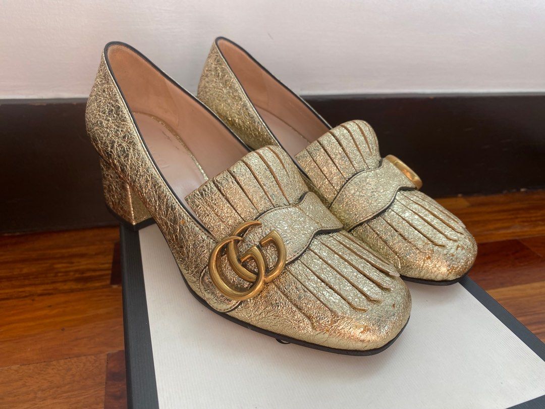 Gucci gold pumps store