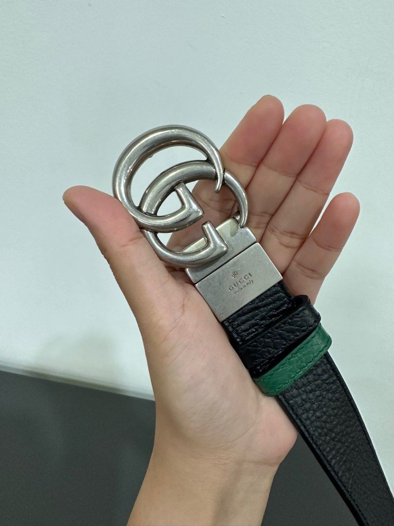 Gucci Reversible Belt (Category: Luxury Accessories) located in Manila. Submitted by elleflores (Listing ID 1257046557, Image 2). Description: Gucci Reversible Belt (Black and Green) with Silver Hardware. With Box and Dustbag :) RFS: Too many belts; Decluttering Message me for more pictures.
