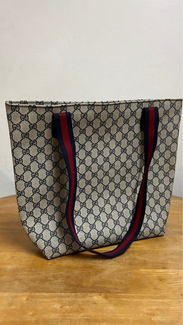 Gucci Vintage Tote Bag (Category: Luxury Bags & Wallets) located in Makati City. Submitted by acebunni (Listing ID 1257039491, Image 2). Description: PLEASE READ DESCRIPTION AND CHECK ALL PICS FIRST ————— Gucci Vintage Tote Bag L 32cm W 37cm (flat) Thickness upto 9.5cm - Original from USA - very good condition - Leather bag - almost negligable flaws despite being in storage on the bag itself - slight strap tear (see pic) Location: Makati, NCR MOP