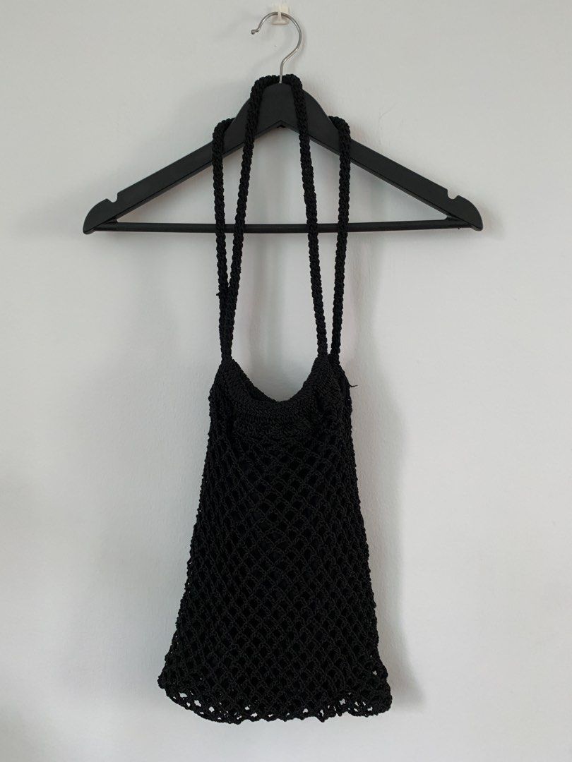 Knitted Black Beach Bag (Category: Beach Bags) located in Pasay City. Submitted by allthatdraft (Listing ID 1257084928, Image 1). Description: Condition 9/10 Payment methods Gcash, BPI, or BDO Shipping methods If within Metro Manila, Grab Express or Angkas padala. If provincial, J&T. Please note that shipping feed shall be shouldered by the buyer. Notes: Photos of the item are provided accordingly. Please use these for your personal inspecation. 