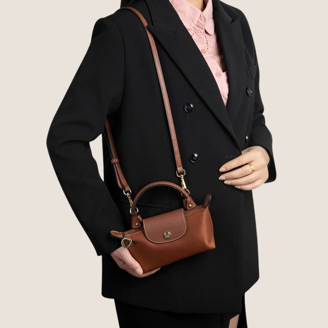 Longchamp Le Pliage Original Pouch with Handle in Cognac, Luxury, Bags &  Wallets on Carousell