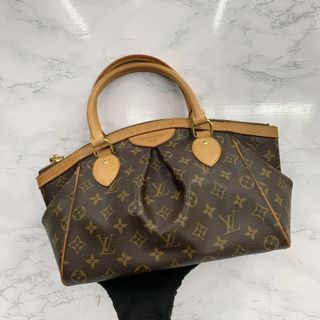 Louis Vuitton LV Neverfull MM Monogram Empreinte Leather Bag (M46516)  $2,850