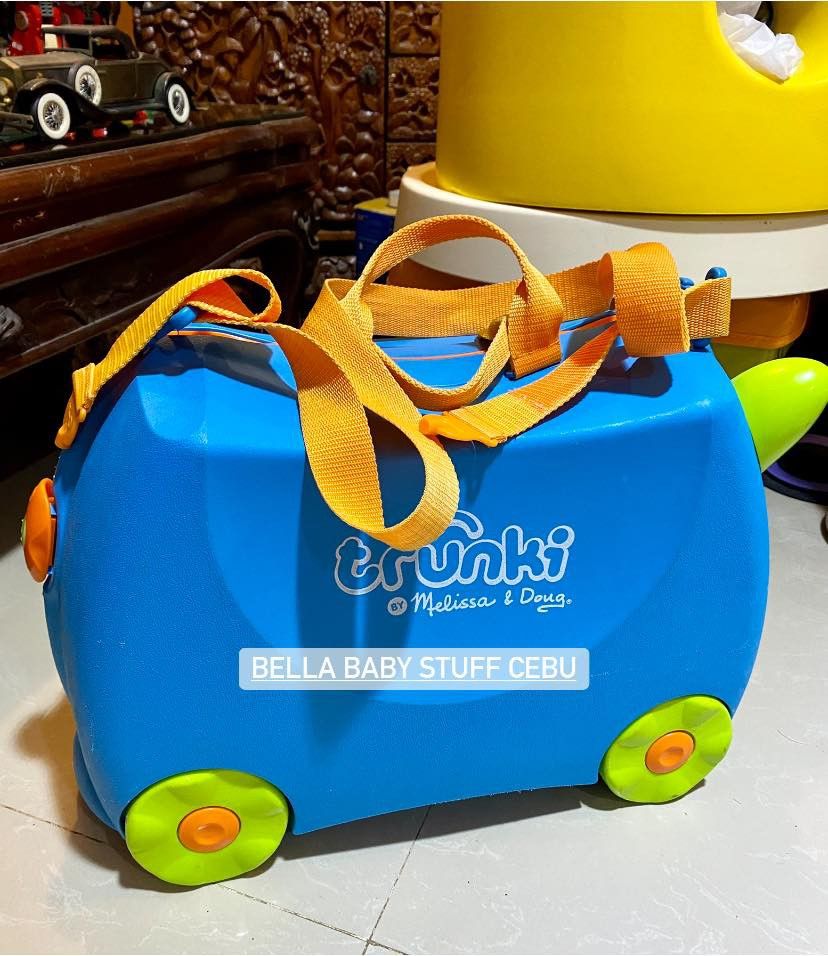 Melissa and doug deals ride on suitcase