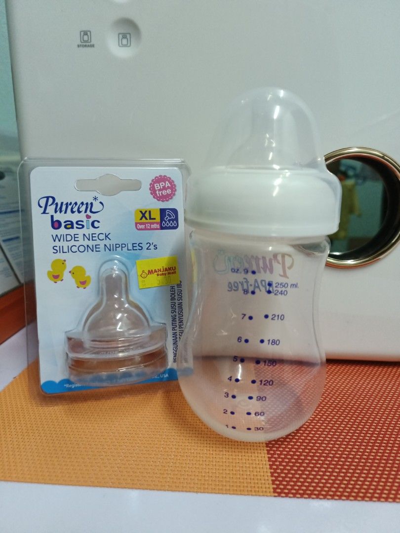 Pureen wide neck bottle and silicone nipples Babies Kids