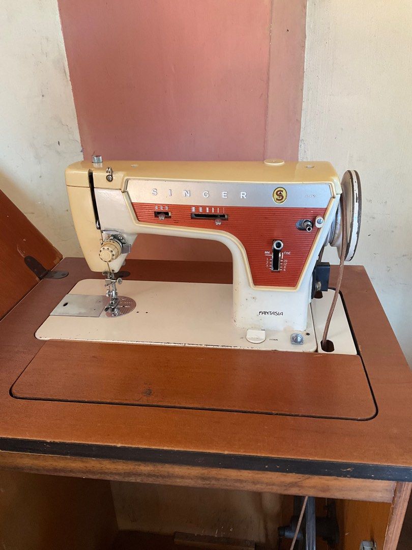 Singer Fantasia Sewing Machine (Category: Other Home Furniture) located in Bacoor. Submitted by shamraq (Listing ID 1257063474, Image 2). Description: Singer Fantasia can be used manually or electric. Electric mode can be fully restored thru repair ( needs new motor and pedal). Manually can be used..