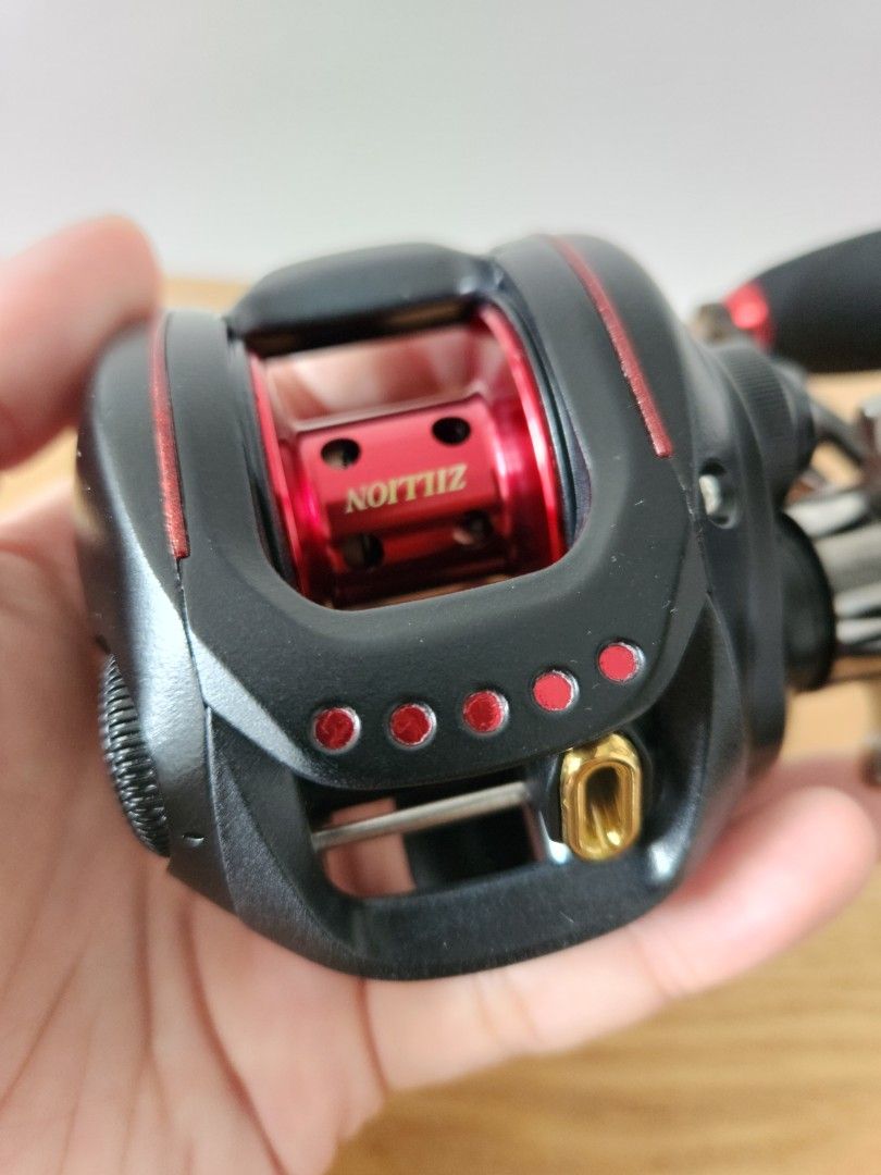 ダイワZILLION 100SHL おまけでTEAMDAIWA-X2500iA s-l400.jpg