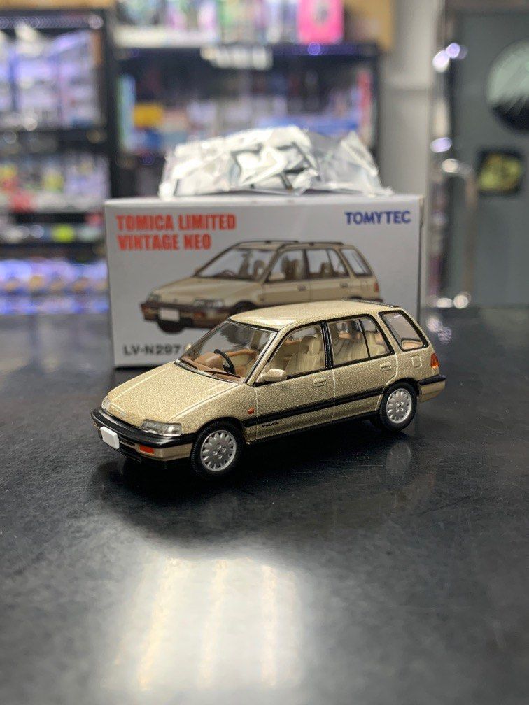 本月新車！Tomica Limited Vintage Neo Tomytec 1:64 LV-N297a 1987 Honda Civic  Shuttle 561i (Beige 金色) (行版), 興趣及遊戲, 玩具 遊戲類- Carousell