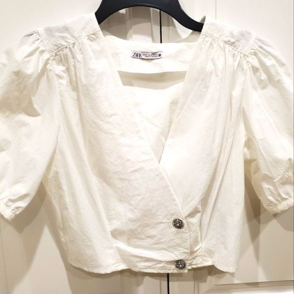 Zara white top crystal buttons (Category: Blouses) located in Quezon City. Submitted by katdcc (Listing ID 1257176208, Image 2). Description: Used once. Good as new. Very nice in actual..