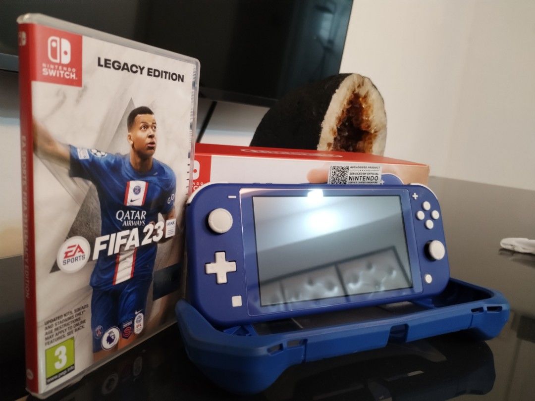 5month old seldom played Switch Lite set with SD Card and FIFA23