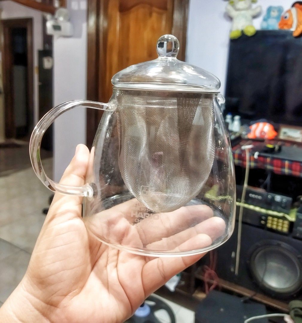 Hario tea pot (Category: Coffee & Tea Tableware) located in Mati. Submitted by surkayconsumergoodstraiding (Listing ID 1257200447, Image 2). Description: HARIO LEAF TEA POT HOT & ICE.🍃🧊 Our original and special design of a larger and longer tea strainer. We added a larger and longer tea strainer so that the tea leaves can expand, and can also be used for small servings. You can enjoy a fruit tea by adding fruits. After removing the tea strainer