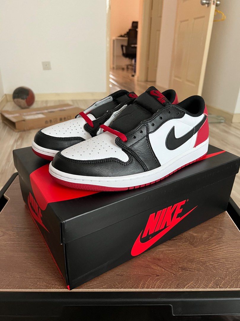 Jordan 1 low black toe size 9 hotsell