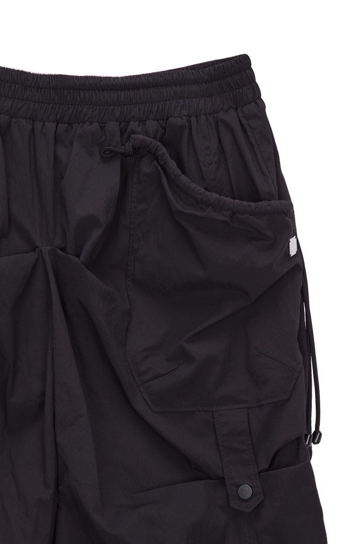 matin Kim black hybrid shirring maxi skirt