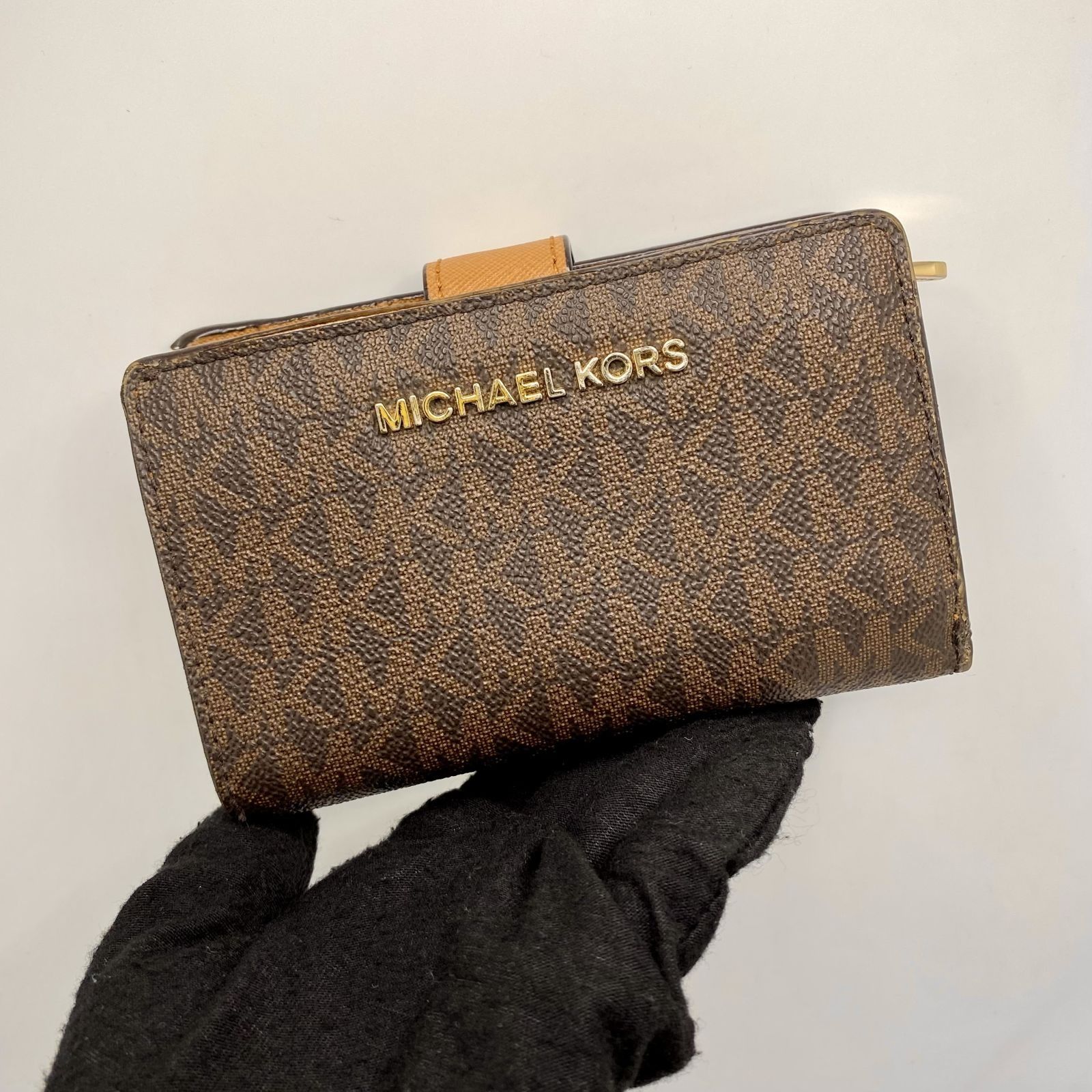 brown mk wallet