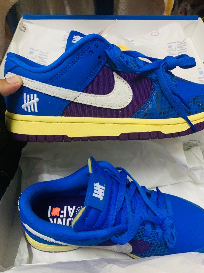 undefeated dunk low stock x