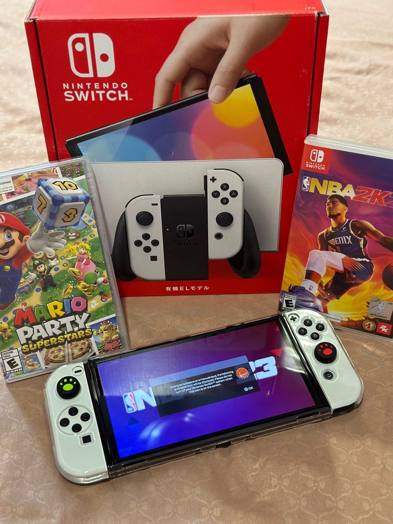 Nintendo Switch OLED (Category: Nintendo) located in Subang Jaya. Submitted by johnchnggg (Listing ID 1257200364, Image 1). Description: Nintendo switch OLED Seldom play so decide to sell it All in good condition Pm me for more details Selling it with original black & white joycon COD - klang / sunway .