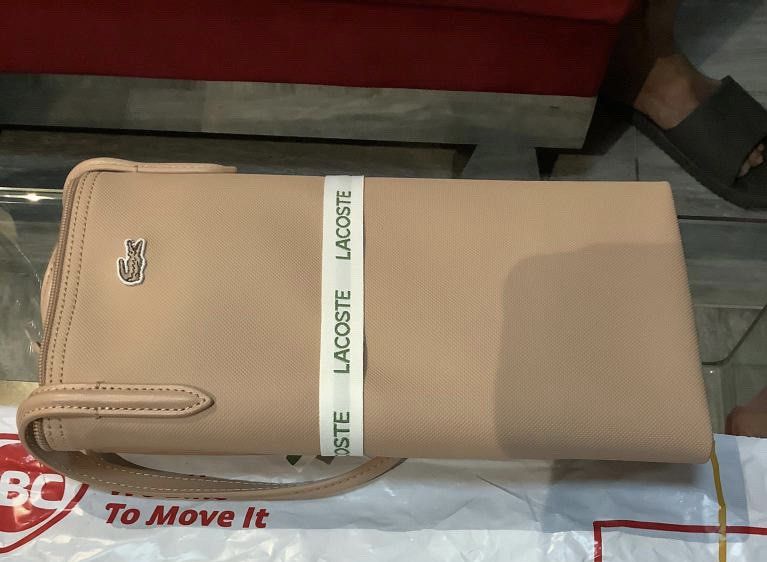 Lacoste bag original vs fake online