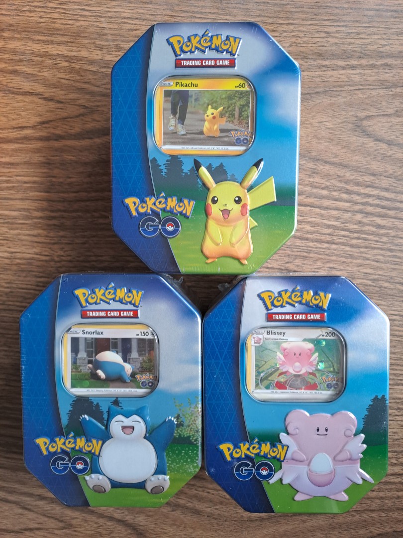 Jogo de Cartas POKEMON Pkm Swsh10.5 Pokémon Go Gift Tin  Pikachu/Blissey/Snorlax