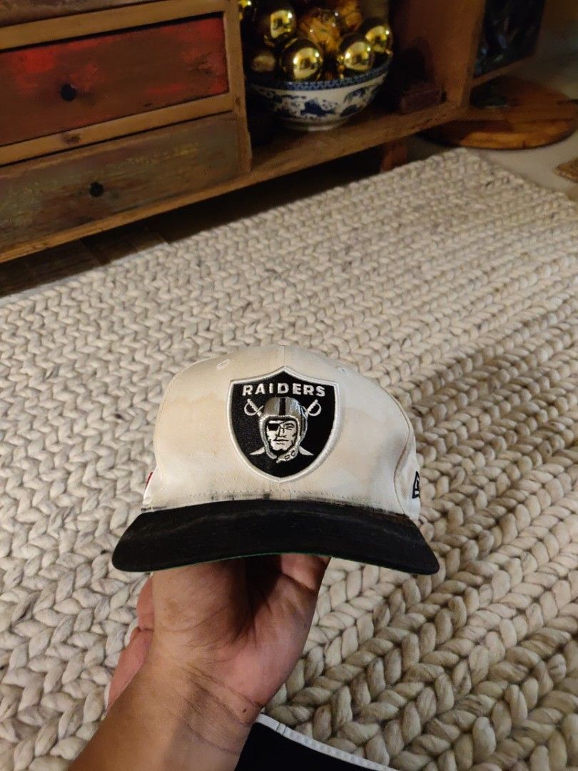 RARE!) Raiders Snapback from early 2000s, Men's Fashion, Watches &  Accessories, Cap & Hats on Carousell