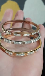 Titanium bangles gold, silver & rose gold. $6 packing + registered mail applies..