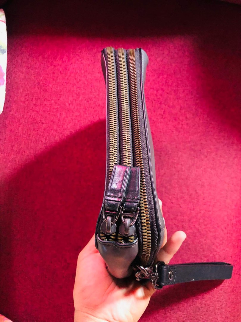 Tumi triple zip clutch bag, Luxury, Bags & Wallets on Carousell