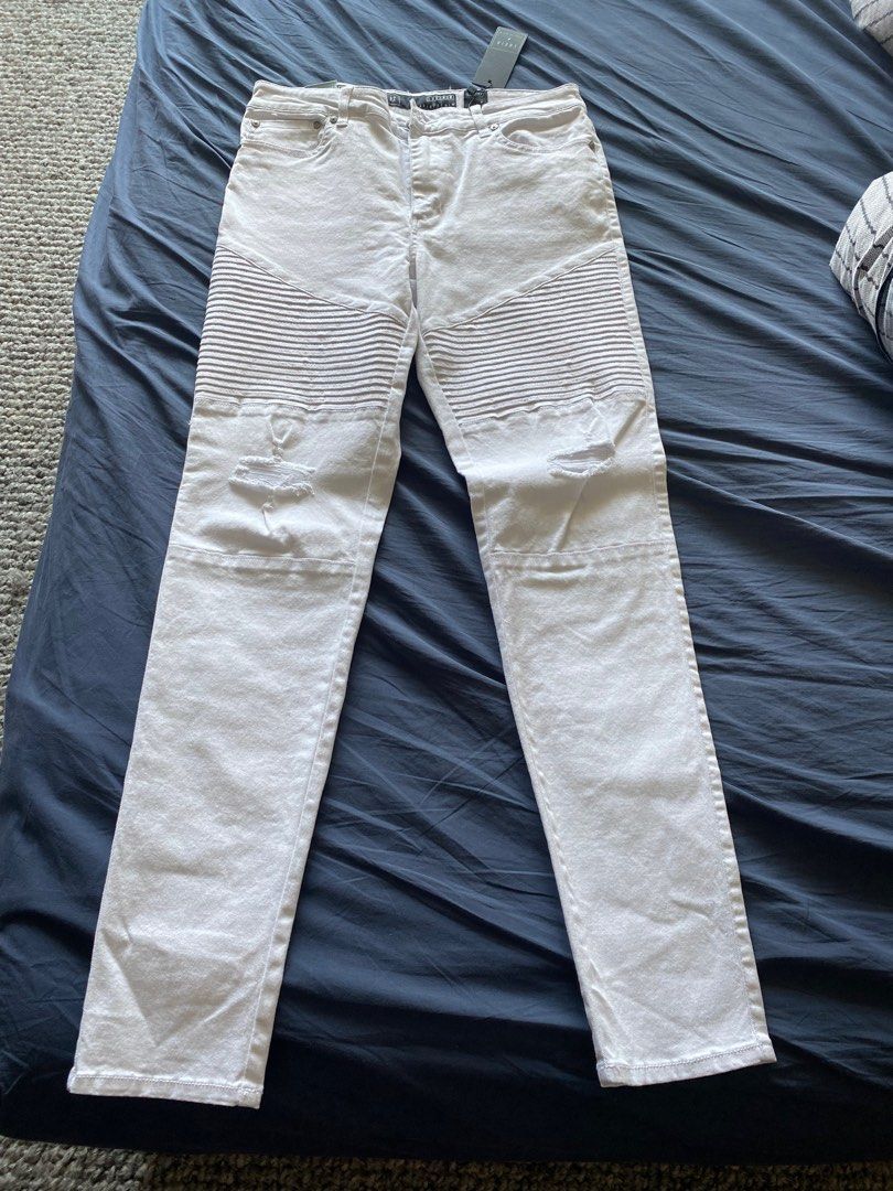 White ripped biker jeans top