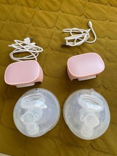2 hands-free breast pumps with box
