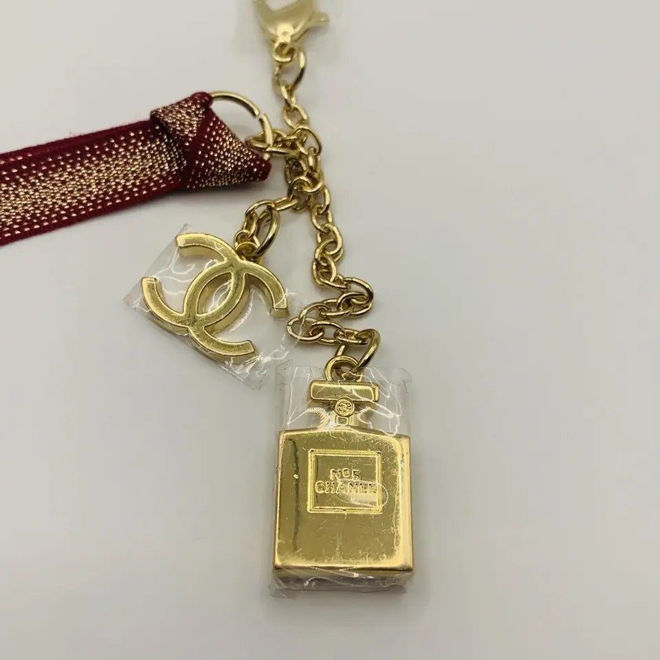 Chanel Key Ring Bag Charm Ribbon Holiday Limited 2022, Women's Fashion,  Jewelry & Organisers, Charms on Carousell
