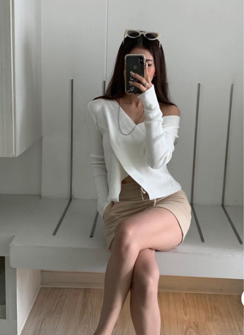 White cross sweater store