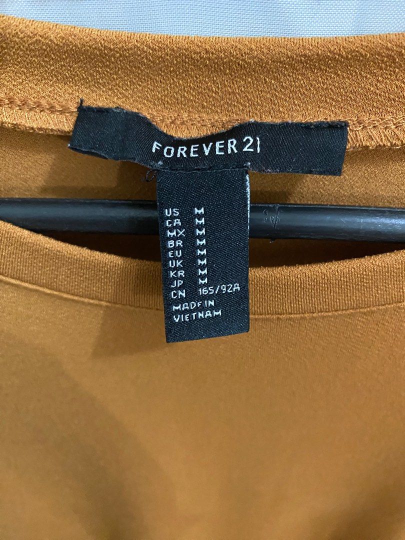 Forever 21 mustard dress (Category: Dresses) located in Caloocan City. Submitted by Yumi_cell (Listing ID 1257466575, Image 2). Description: Used a few times. Perfect for casual.