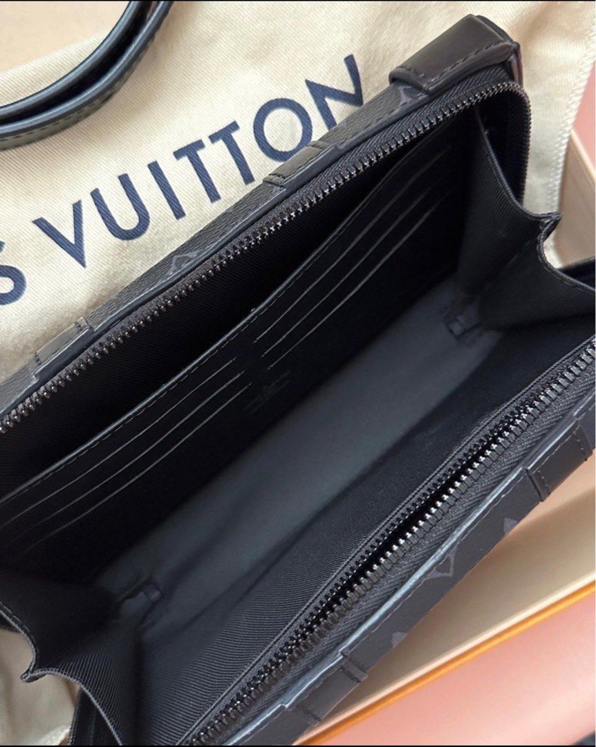 Louis Vuitton Soft Trunk Wearable Wallet, Luxury, Bags & Wallets on  Carousell