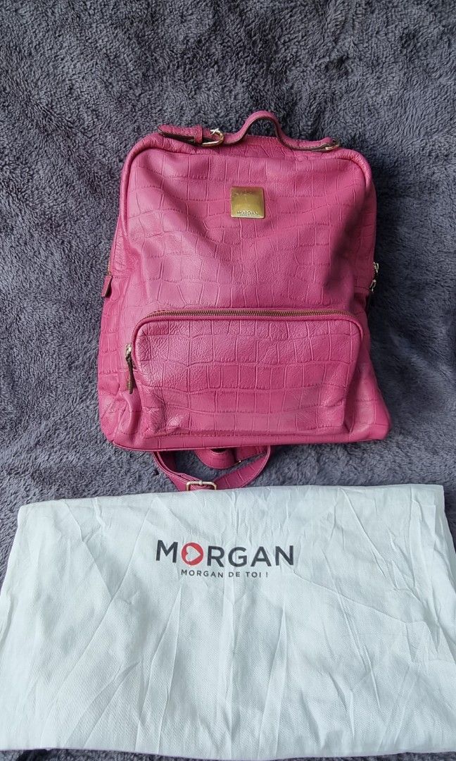 Original Morgan Pink leather backpack (Category: Backpacks) located in Talisay. Submitted by parchiracollection (Listing ID 1257417107, Image 1). Description: *with dust bag * Plus sf * Please check pictures *washed and disenfected already * This is a second-hand item, kaya wag po mag expect na BAGO *no to low ballers. The discounted price I'll give is the final price. *NO COD, NO COP, NO SHOPEE CHECK OUT *MOP: GCASH, BDO, RCBC *COURIERS: FLASH E