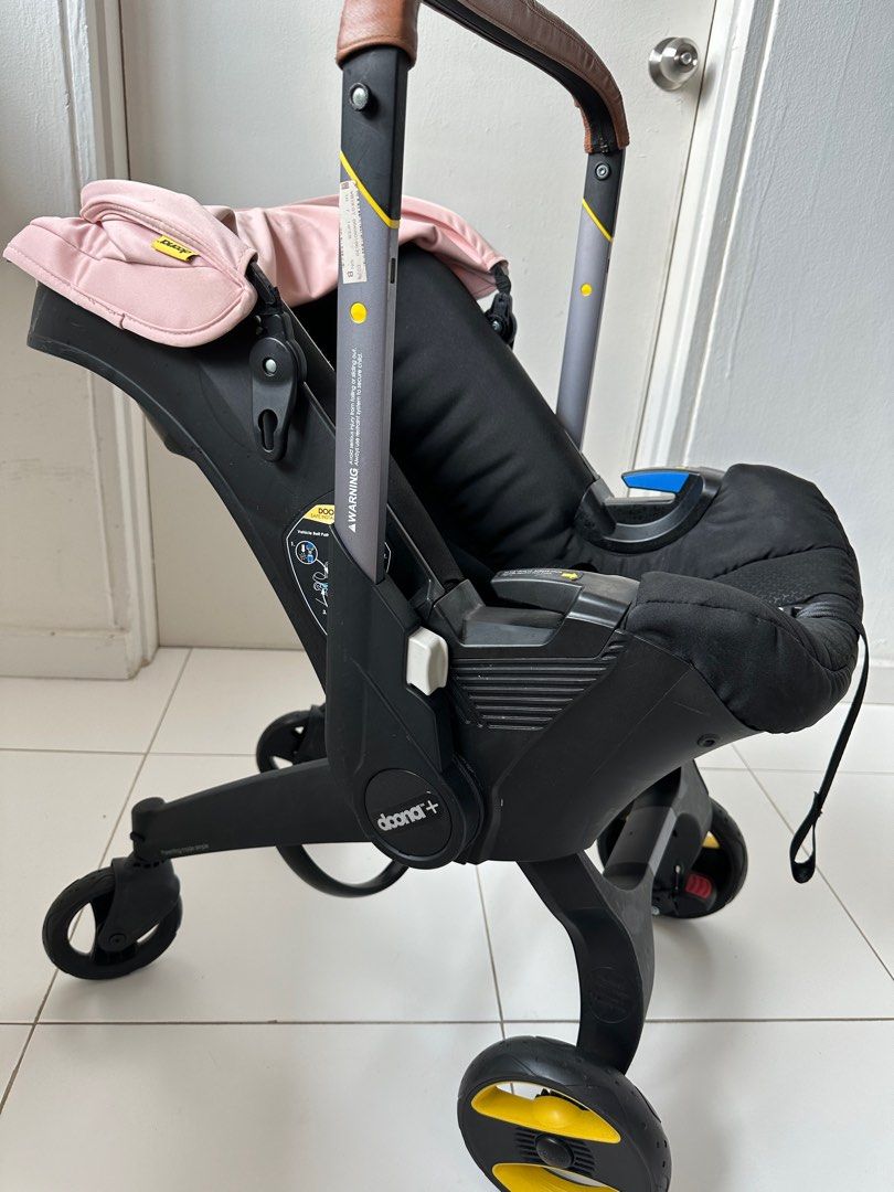 Pink doona stroller clearance